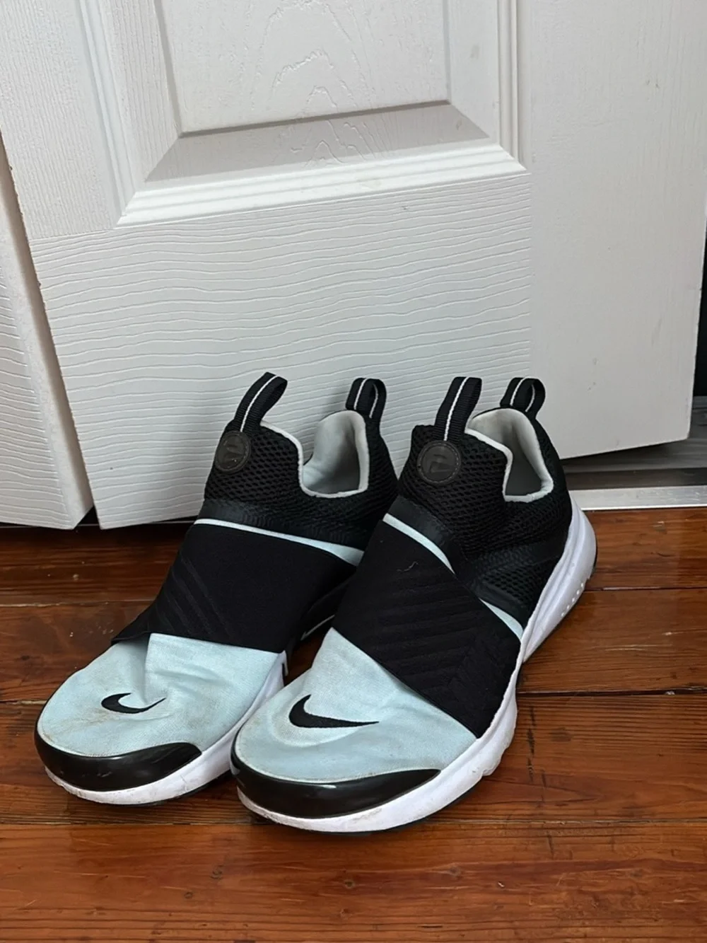 Nike Slip-On Trainers in Black & Light Blue